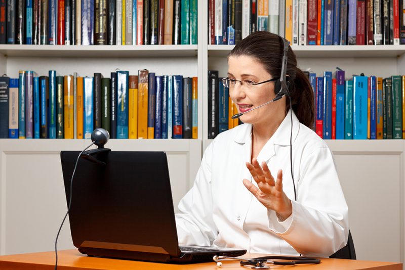 female veterinarian doing online consultations